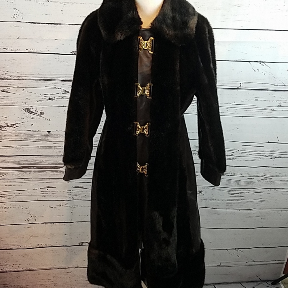 Make an offer!Vintage faux fur coat w/leather trim